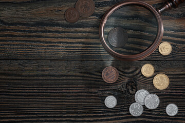 Numismatics. Old collectible coins of silver, gold and copper on the table.
