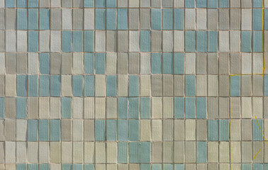 Texture of a colorful tiled exterior wall