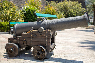 Fototapeta na wymiar Old military cannon for shooting. Medieval weapons. Ancient artillery. Kotor Montenegro.