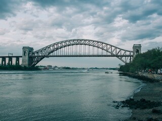 The Hells Gate Bridge over the East River, seen from Astoria, Queens, New York