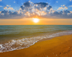 sandy emerald sea beach at the dramatic sunset,  summer sea vacation background