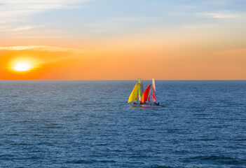 pair of small sail yacht in sea at the evening, ail sport background