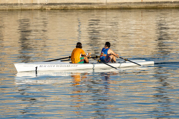 Oar with two guys training