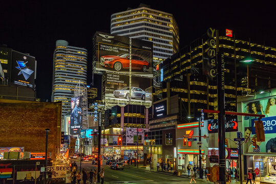 TORONTO, CANADA - SEPTEMBER 15, 2017:Billboards on Yonge Street - the main street of Toronto illuminated at night.
