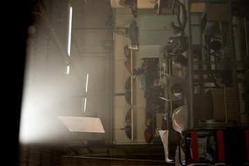 Dark shabby garage with motorcycles parts