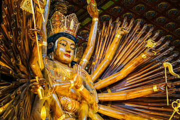 Close up picture. Guanyin 1000 hand carved at mettatham temple in Kanchanaburi