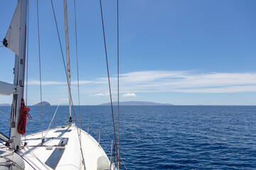 Aegean sea sailing, summer holidays in Cyclades islands, Greece.