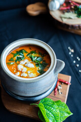Herbed Crabs Curry with Wild Betel Leaves on wooden board - Asian food style