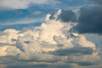 Blue sky background with tiny clouds