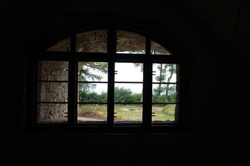 View through the window from the interior of the old fort 