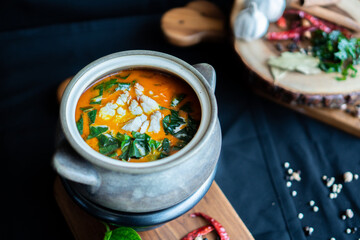 Herbed Crabs Curry with Wild Betel Leaves on wooden board - Asian food style