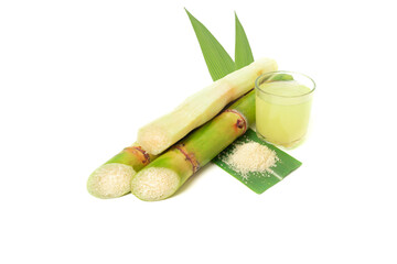 green sugar cane and brown sugar on white isolate background