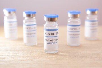 Coronavirus Vaccine covid-19 ampoules on light background	