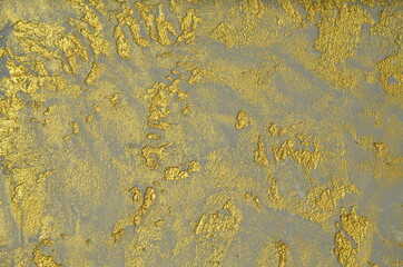 decorative, rough plaster.
painted with gilded paint in places