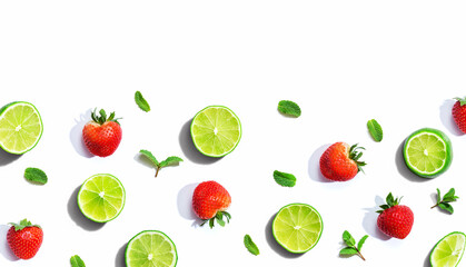 Fresh limes and strawberries with mints