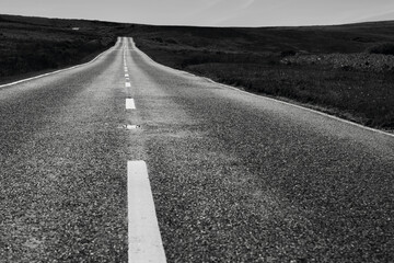 Long straight road across the moors on the Gower Peninsula. 