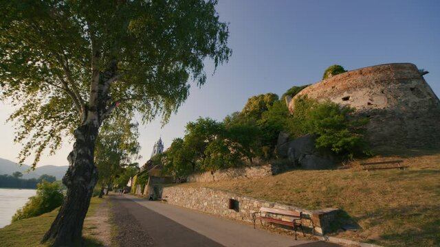 Beautiful wide view of the Durnstein along the Danube River in the picturesque Wachau Valley in daylight. a UNESCO World Heritage Site. Side view of D&uuml;rnstein Abbey. Former monastery in Wachau.	