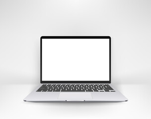 Modern laptop with blank screen in white interior