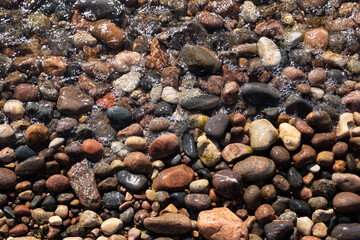 on the shores of the Baltic Sea there are stones of different colors, which form a beautiful pattern with each other