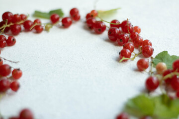red currants on a wooden table