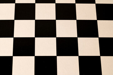A checkered background photographed in a studio.