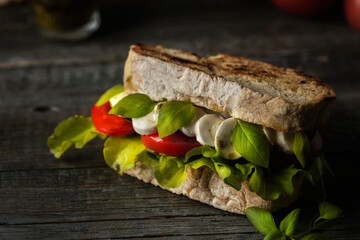 sandwich with mozzarella and tomatoes