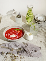strawberry soup with cream on the table