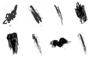 Black paint brushes on white background. Abstract paint shapes for art design