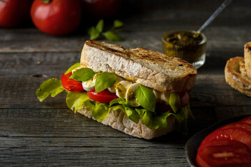 sandwich with mozzarella and tomatoes