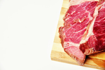 Fresh meat on a wooden cutting board