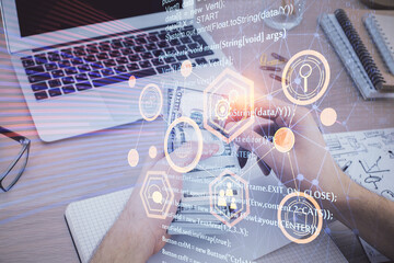 Multi exposure of technology drawing hologram and us dollars bills and man hands. Data concept