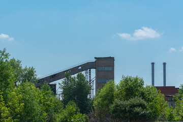 Fototapeta na wymiar a ruined industrial building in the background