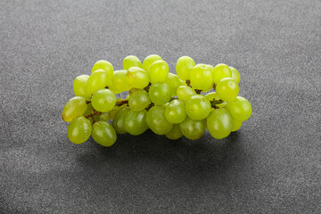 Ripe sweet green grape branch
