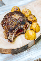 Dry aged rib eye steak on a charcoal grill