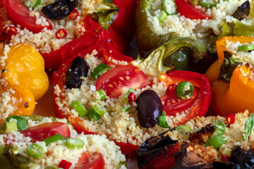 Stuffed Peppers filled with cous cous, tomato,chilli,onion and black olives