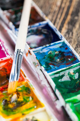 mixed together multi-colored paints