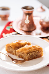 Bosnian and Turkish dessert called Baklava served in a traditional way with coffee
