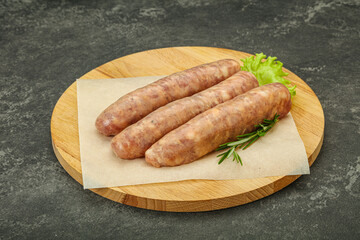 Raw pork meat sausages for grill