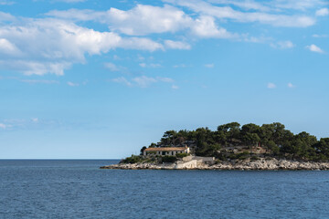 A small church on the shore of a small island right on the Adriatic Sea on the island of Hvar