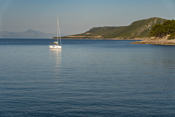 Fototapeta premium View of the sea and the distant stone shores of the island of Hvar in Croatia