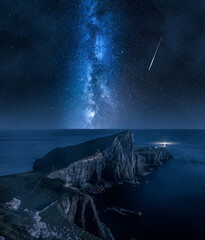 Milky way and Neist point lighthouse, Isle of Skye, Scotland