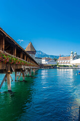 Fototapeta na wymiar LUCERNE, SWITZERLAND, 8 AUGUST 2020: The beautiful landscape of the Kapellbrücke bridge