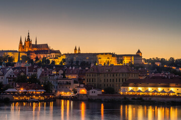 PRAGUE, CZECH REPUBLIC, 31 JULY 2020: Amazing sunset over the castle of Prague and the Vltava river