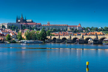 Obraz premium PRAGUE, CZECH REPUBLIC, 31 JULY 2020: Beautiful cityscape over the Vltava River
