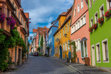 Fototapeta na wymiar ROTHENBURG OB DER TAUBER, GERMANY, 26 JULY 2020 Colorful houses in the street of the historic center