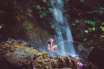 person in the waterfall
