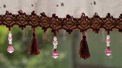 The curtains on the window. Window decoration.