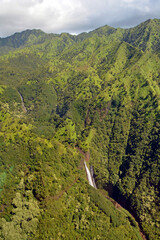 mana waiopuna falls and mountains 
 in a lush rain forest, as seen from a helicopter  near waimea canyon, kauai,  as seen from a helicopter