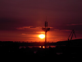 Fototapeta premium Red morning sky and a sun