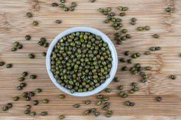 Green bean or mung bean or moyashi bean on wooden table background.